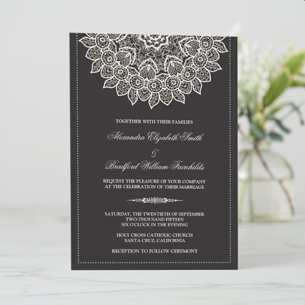 Elegant wedding invitation with floral design.