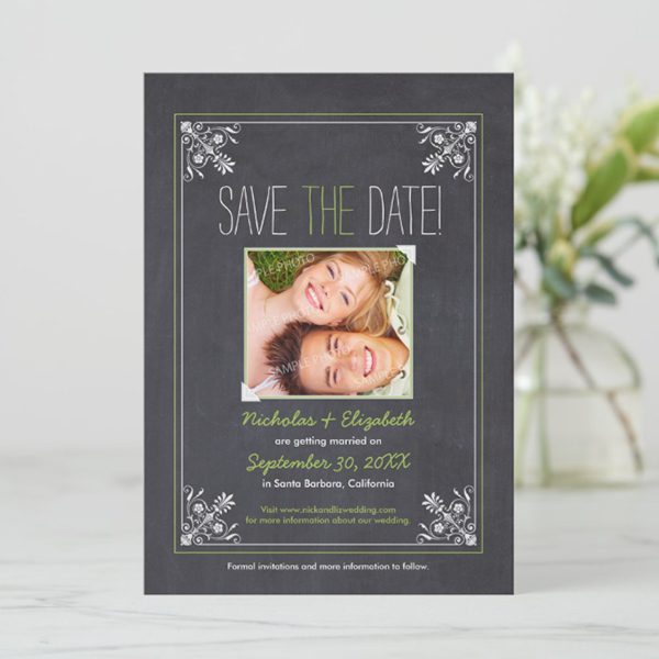 "Save the date card with joyful couple's photo."