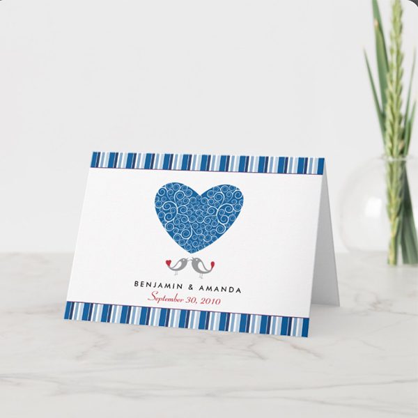 Whimsical wedding announcement with heart design.