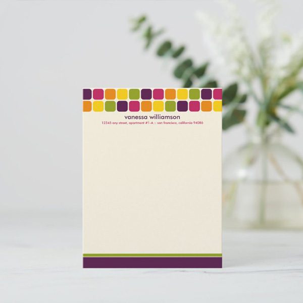 Colorful personalized stationery with address details.